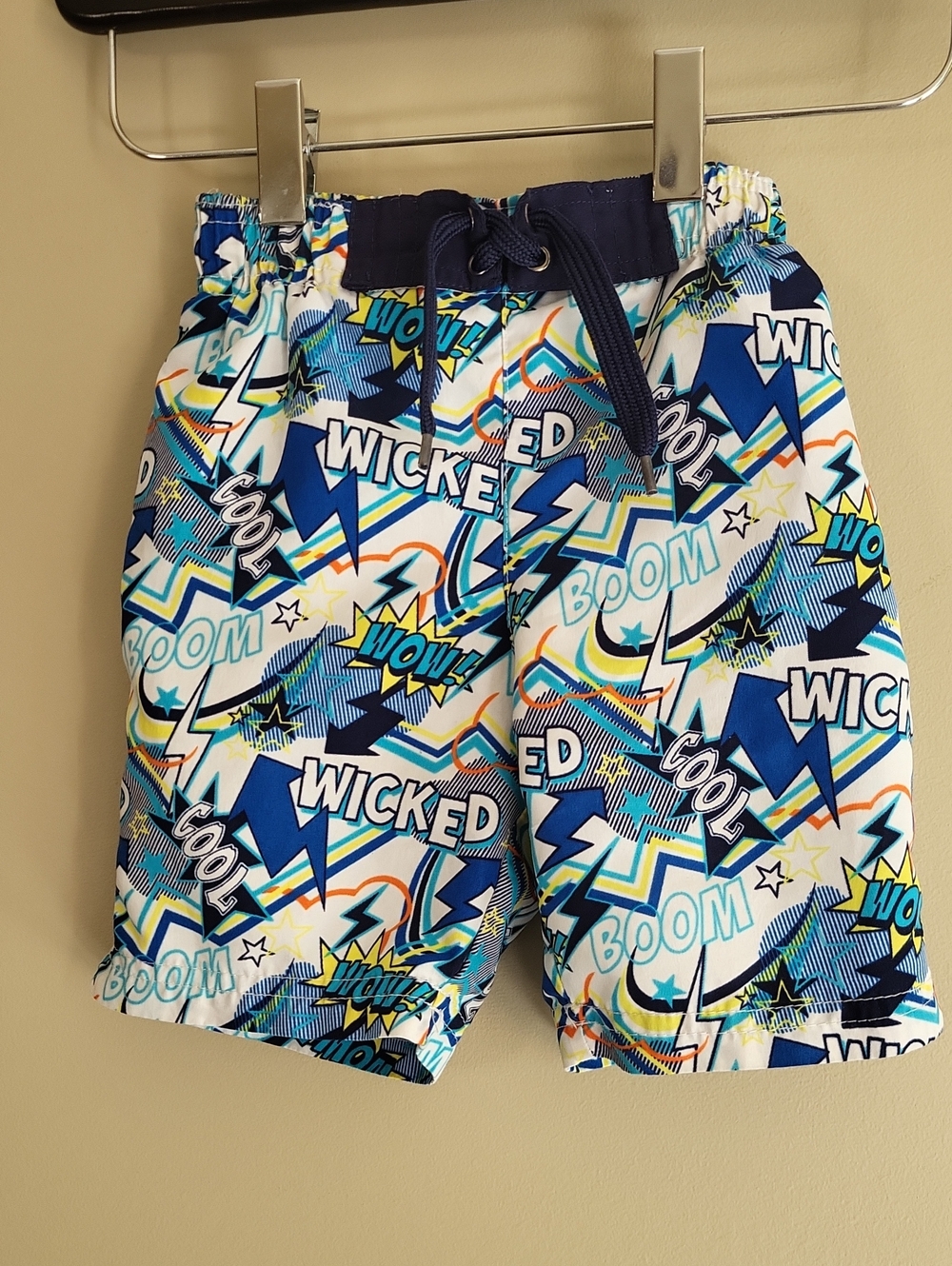 Comic style graphic mesh lined swim trunks